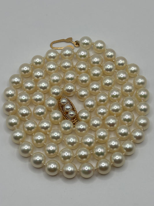 Long 24” vintage pearl necklace with 14k yellow gold clasp