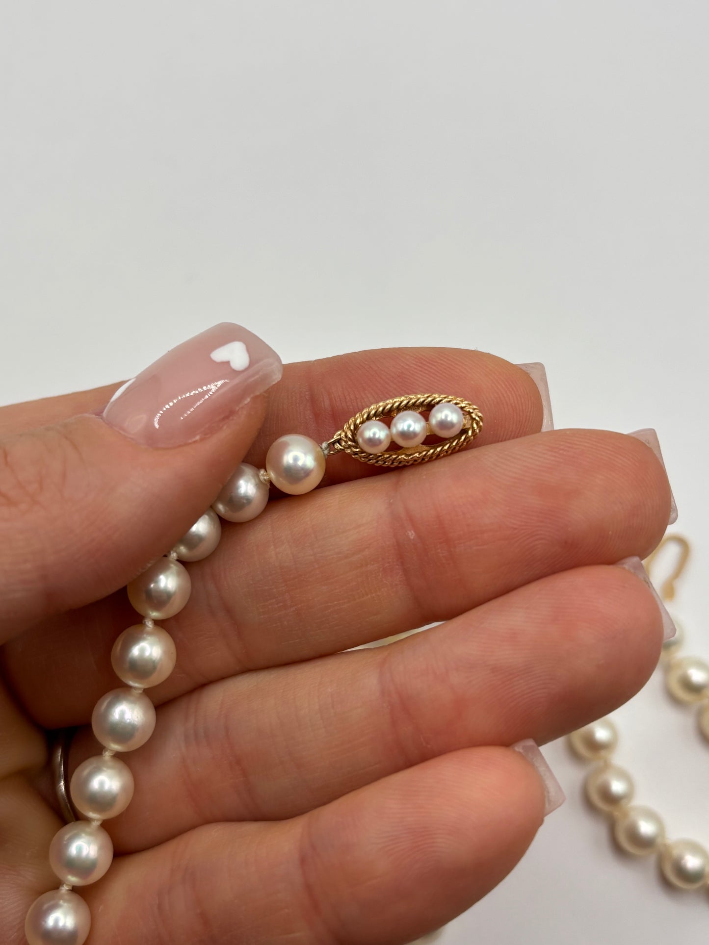Long 24” vintage pearl necklace with 14k yellow gold clasp