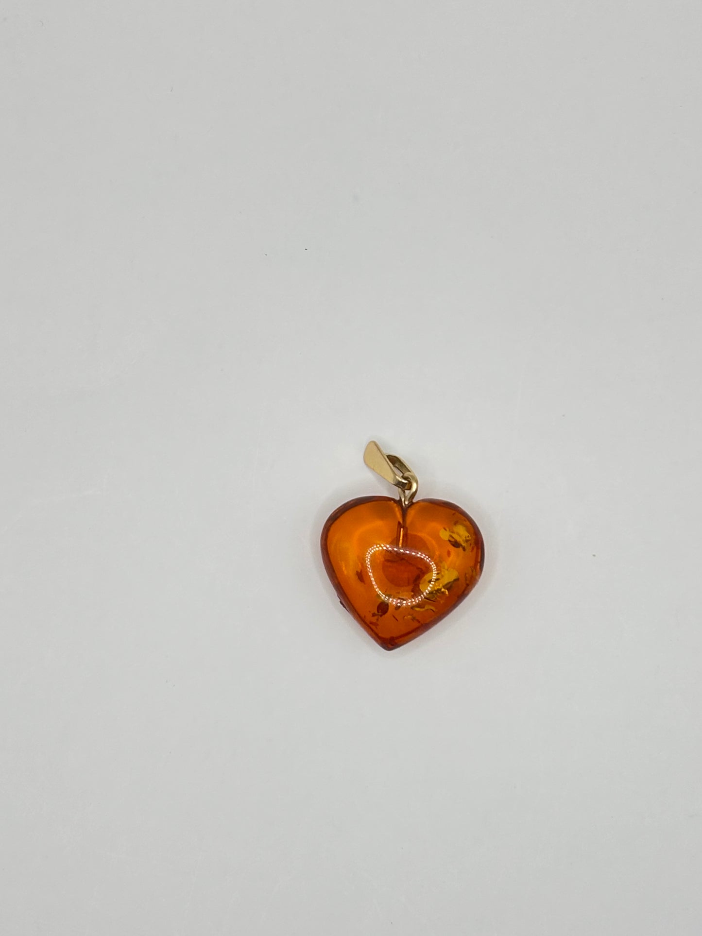 Baltic heart shaped amber pendant