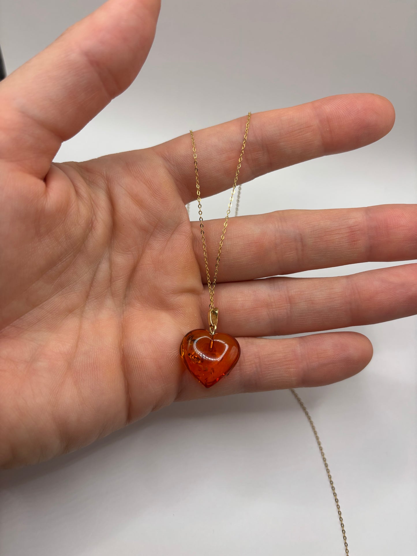 Baltic heart shaped amber pendant