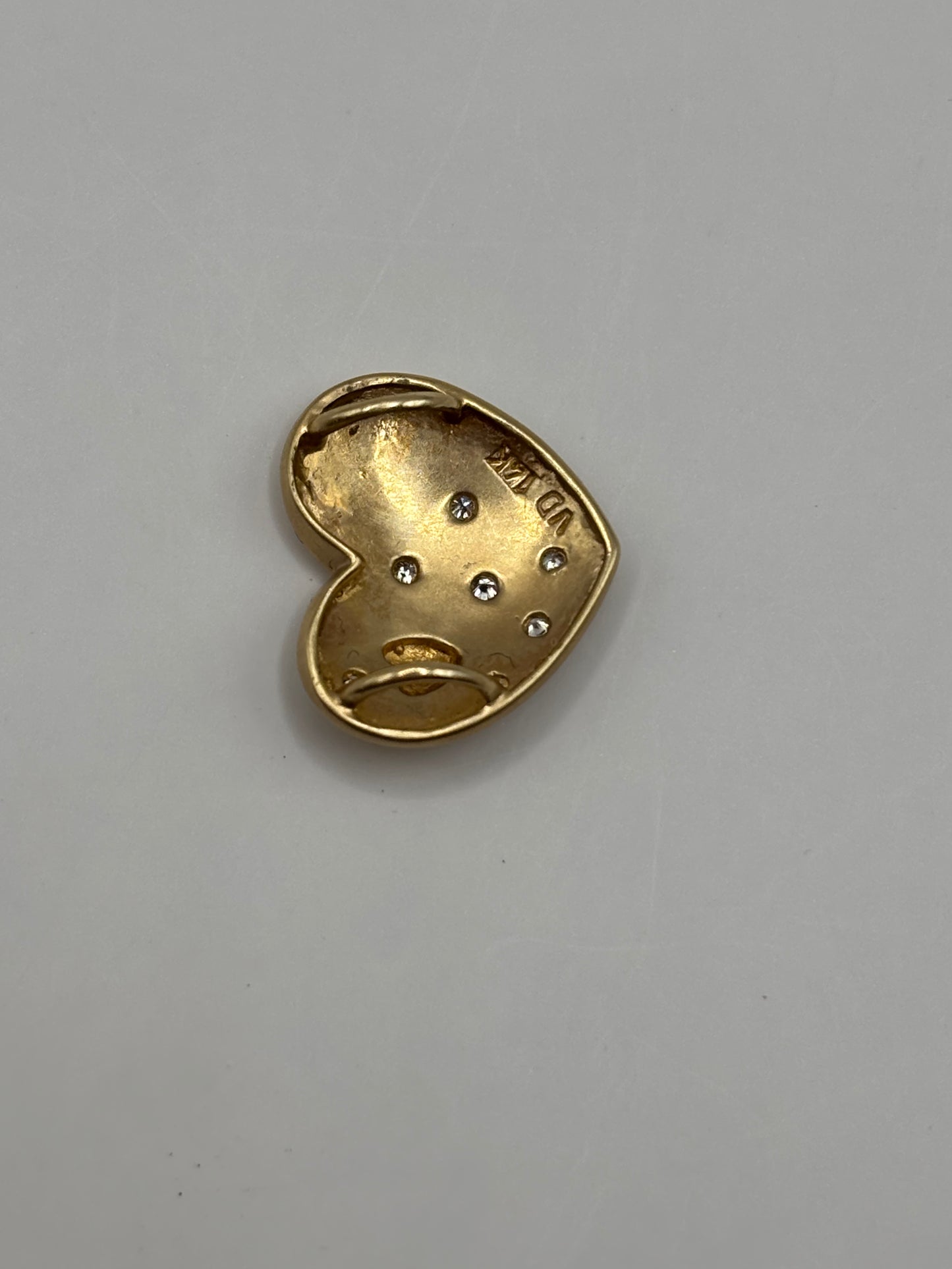 Heart pendant with diamonds