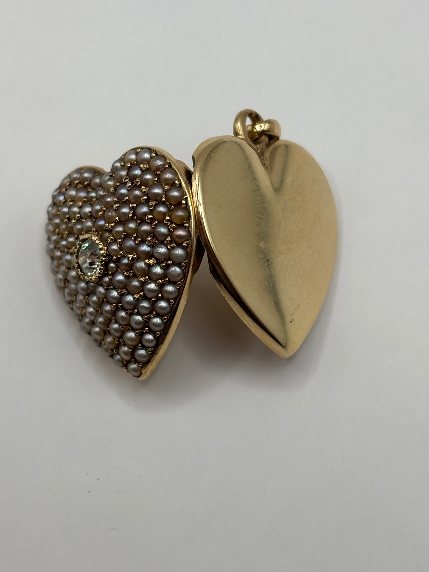 Antique seed pearl heart locket with diamond