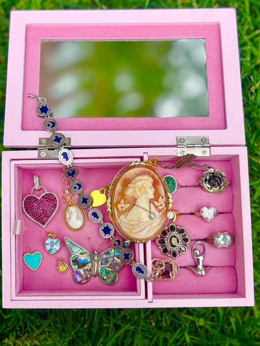jewelry box with jewelry inside, top view