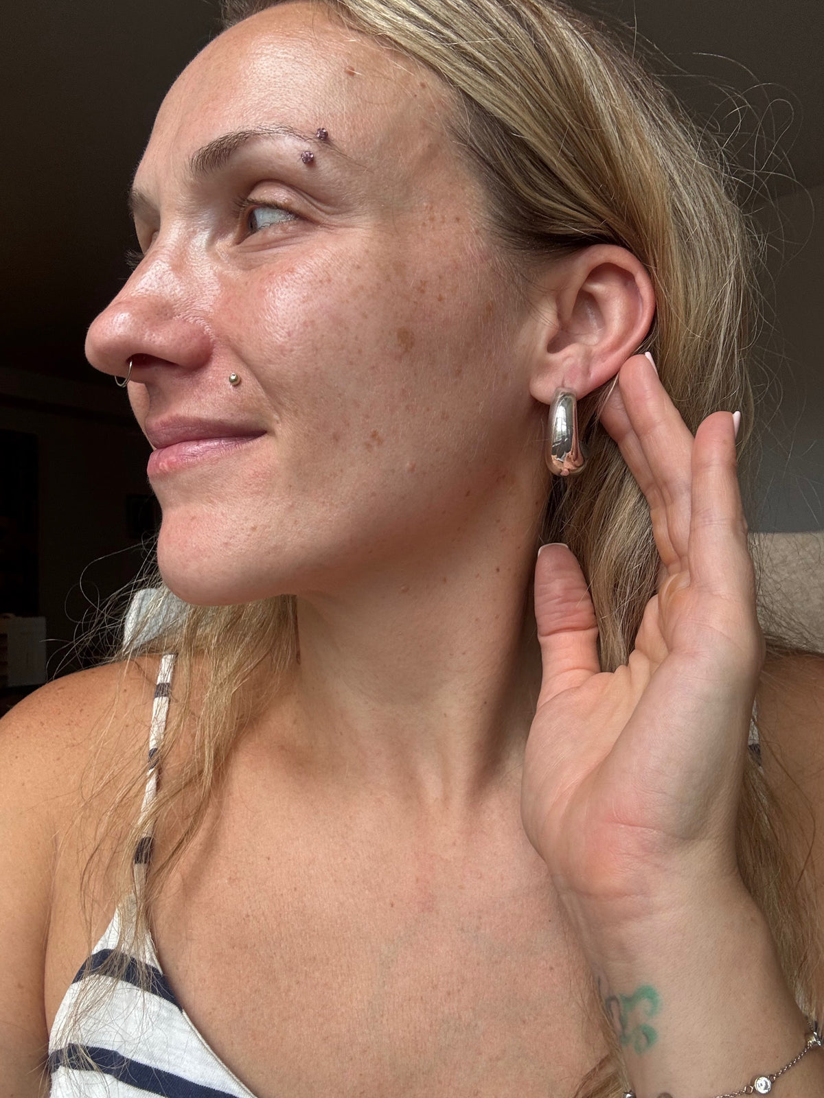 J hoop stud earrings, worn view